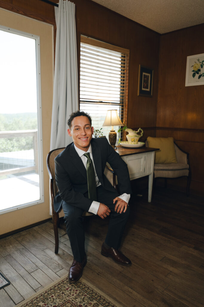 nick-founder-hayes-advertising-sitting-in-suit